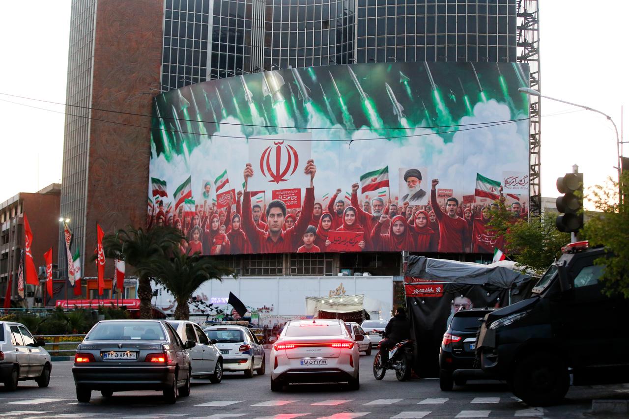 A view of gigantic poster as daily life continues despite the ongoing conflict in Tehran, Iran, April 1, 2026. (AA Photo)