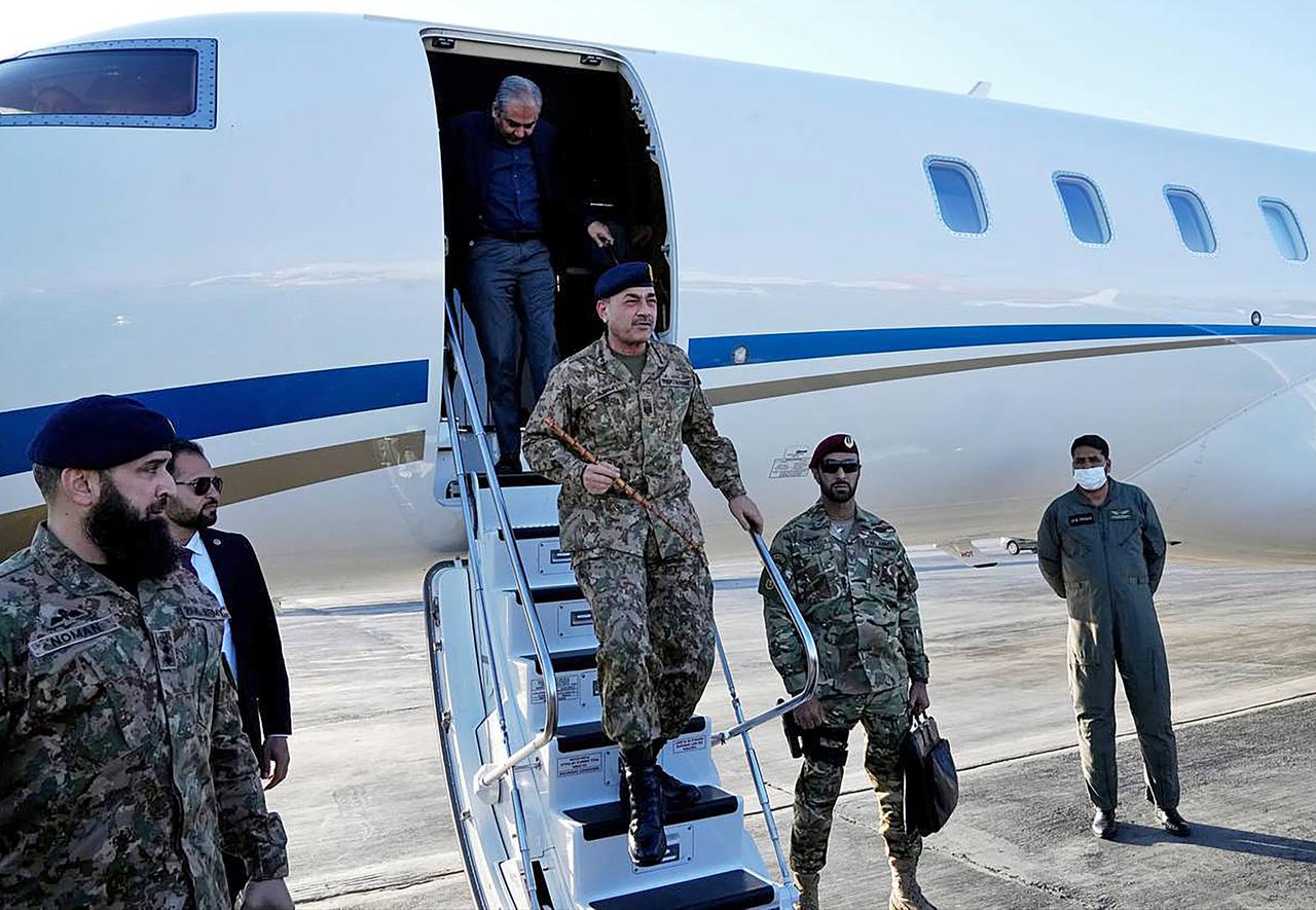 This handout photo taken on April 15, 2026 shows Pakistan's Army Chief Asim Munir disembarking from an aircraft upon his arrival at the airport in Tehran, Iran. (Photo by Iranian Foreign Ministry / AFP)