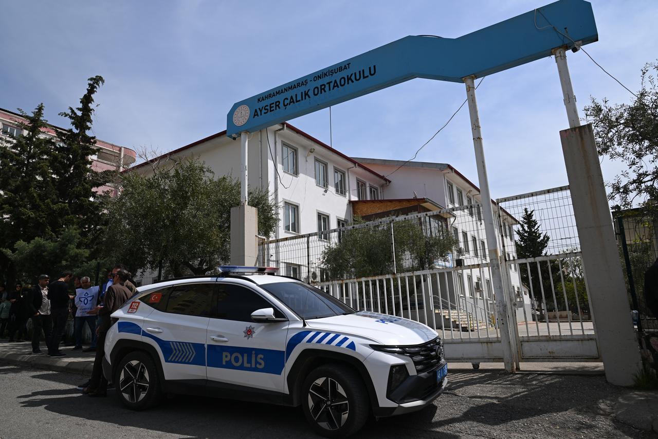 A police vehicle is parked outside the Ayser Calik college, ahead of the funerals for nine victims killed in a school shooting in Kahramanmaras, April 16, 2026. (AFP Photo)
