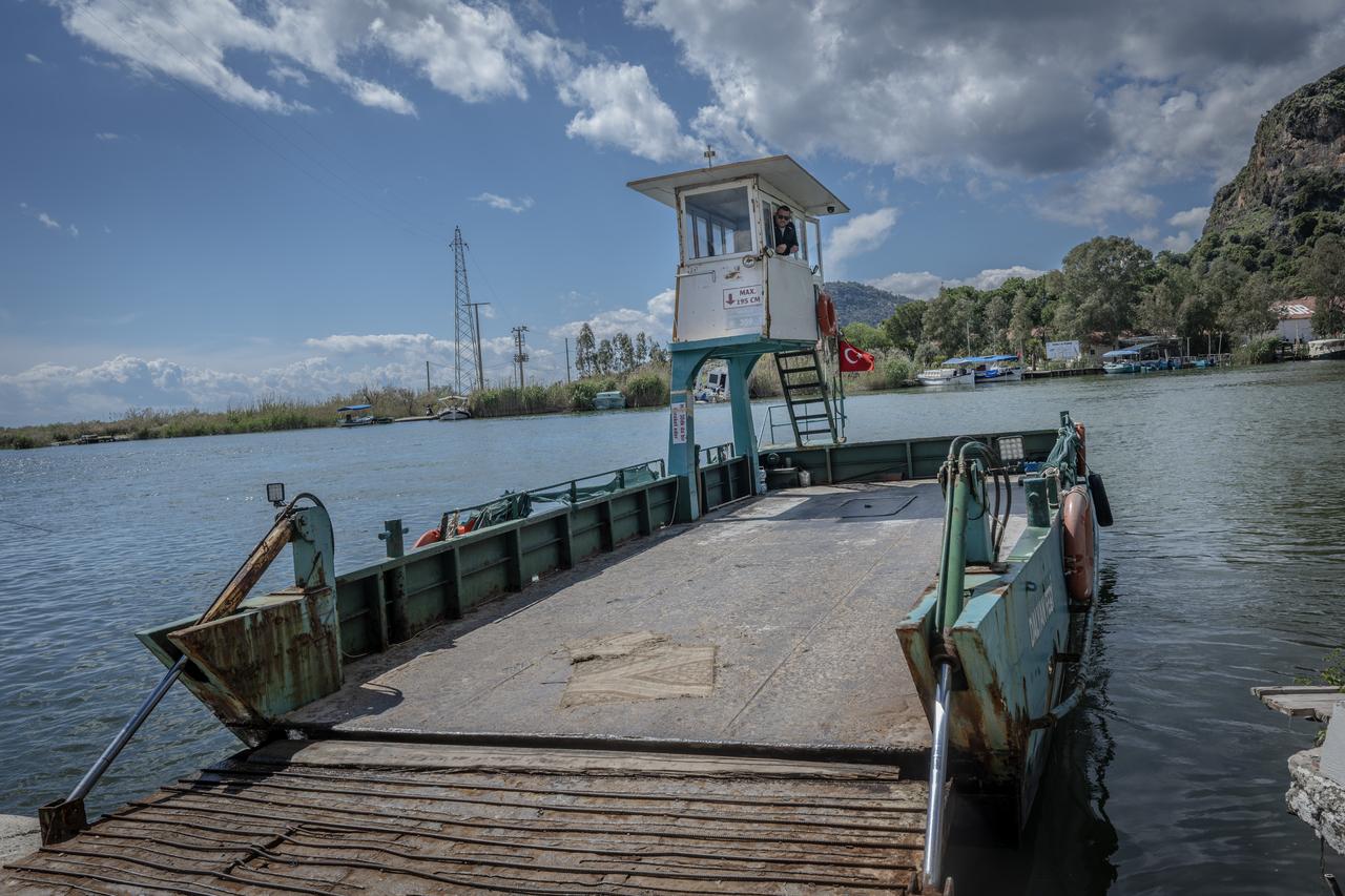 Dalyan Canal ferry connects the two shores between Koycegiz and Ortaca in Mugla, Türkiye. (AA Photo)