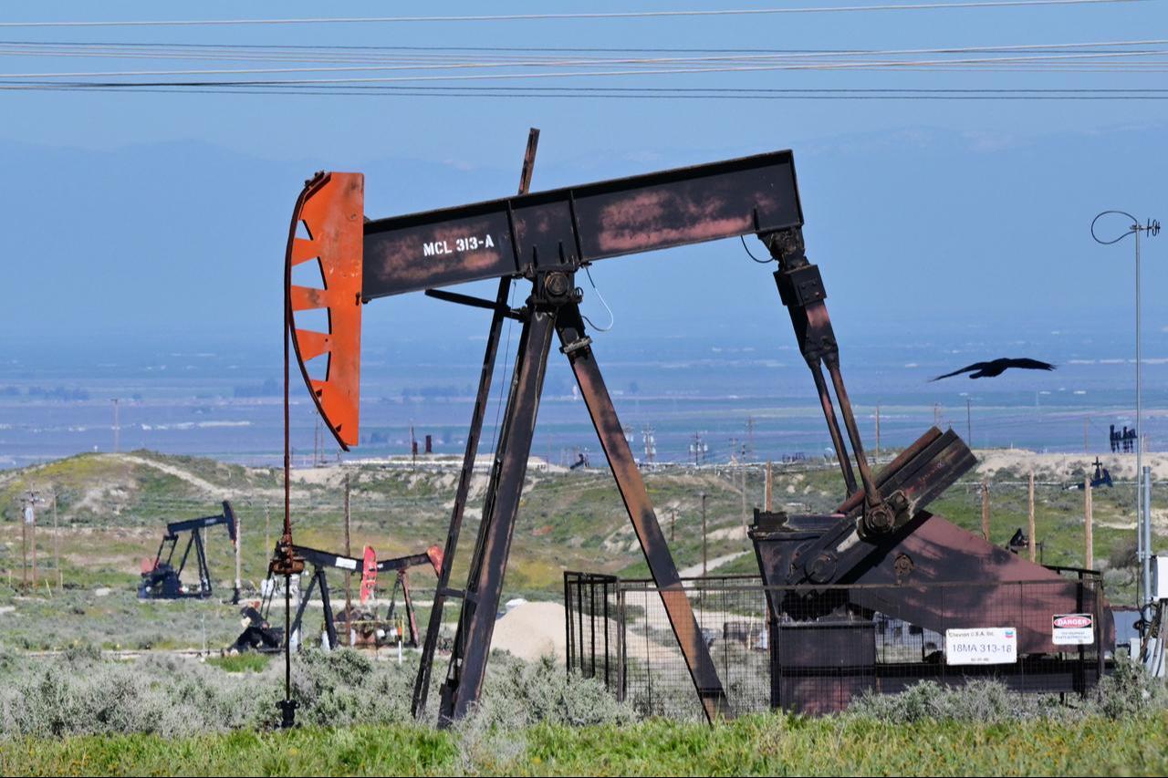 Oil pumpjacks work the Midway-Sunset Field in Kern County outside of McKittrick, California, on March 8, 2026. (AFP Photo)