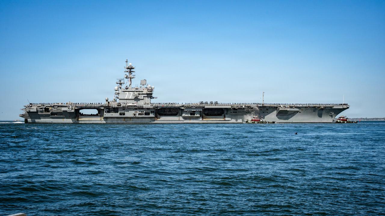 The Nimitz-class aircraft carrier USS George H.W. Bush (CVN 77) departs Naval Station Norfolk to begin operations in support of its scheduled deployment, March 31, 2026. (Photo via U.S. Navy)