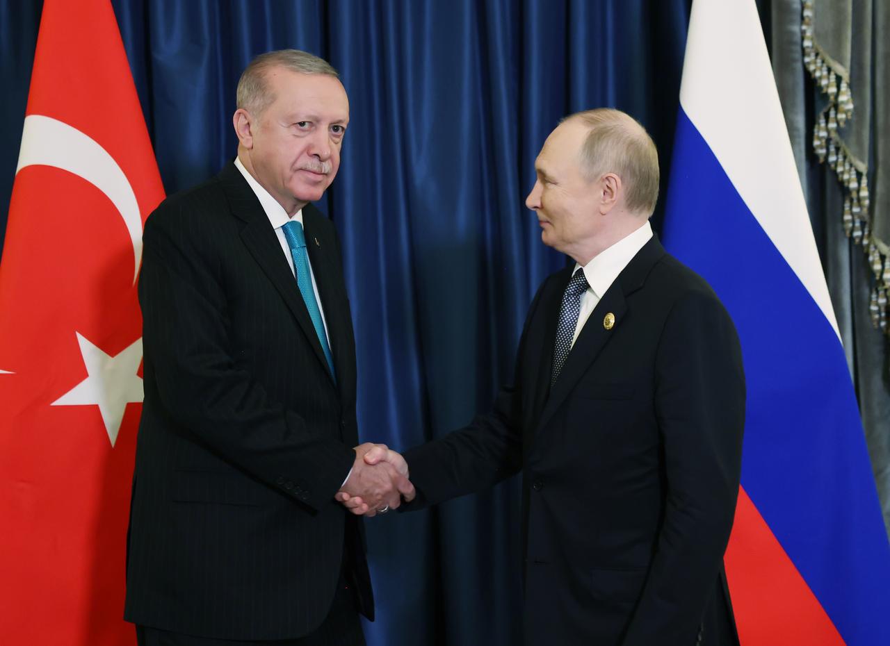 Turkish President Recep Tayyip Erdogan (L) and Russian President Vladimir Putin (R) shake hands after their meeting before the start of the meeting of the Council of Heads of State of the Shanghai Cooperation Organisation (SCO) Summit 2025 in Tianjin, China on September 01, 2025. (TUR Presidency/AA Photo)