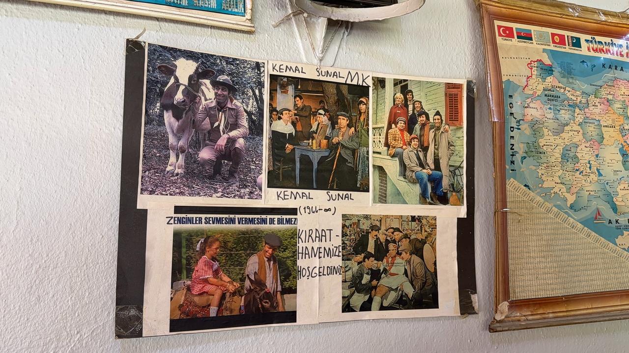 Posters of iconic Turkish actor Kemal Sunal hang on the wall of a local coffeehouse in Bogazkoy, Arnavutkoy, Istanbul, Türkiye. (IHA Photo)
