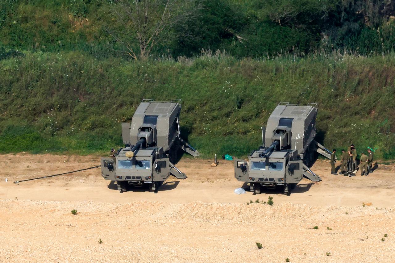 Israeli soldiers next to artillery vehicles (SIGMA 155) deployed in the Upper Galilee near the Israel-Lebanon border on April 16, 2026. (AFP Photo)