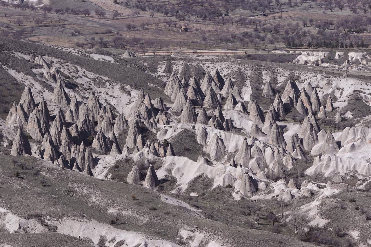 Fairy chimneys and the rugged terrain of Cappadocia stretch across the landscape as seen from Meryem Ana Mountain, highlighting the region’s distinctive geology in Nevsehir, Türkiye. (AA Photo)