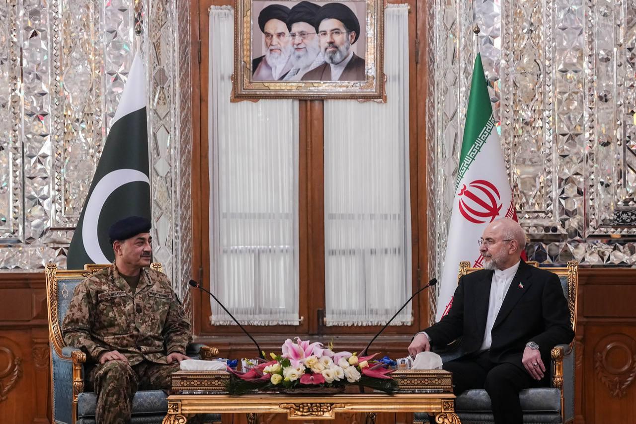 Speaker of the Iranian Parliament Mohammad Bagher Ghalibaf (R), who also heads Iran’s negotiation delegation in talks with US, meets with Pakistan’s Chief of Army Staff Asim Munir (L), April 16, 2026, in Tehran, Iran. (Photo via Iranian Parliament Speaker Office)