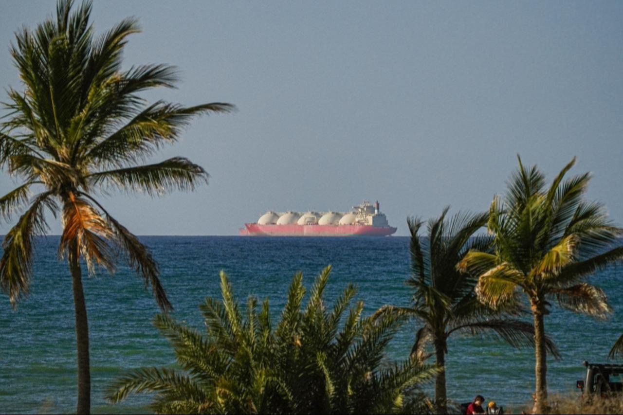 A view of the vessels passing through the Strait of Hormuz following the two-week temporary ceasefire reached between the United States and Iran, seen in Oman, on April 8, 2026. (AA Photo)