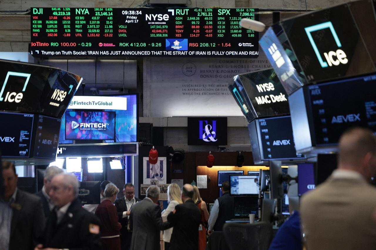 Stock market numbers are displayed on the floor of the New York Stock Exchange during morning trading, in New York City, April 17, 2026. (AFP Photo)