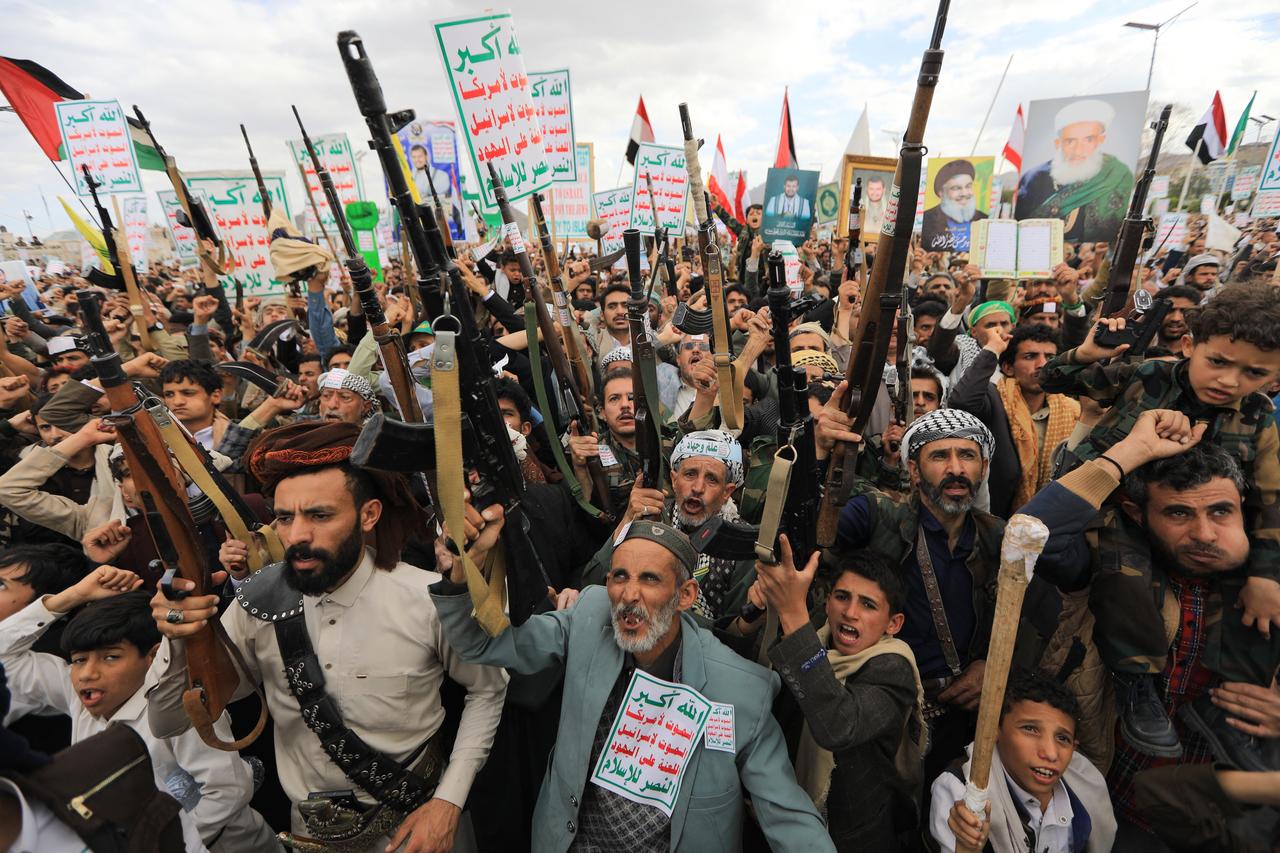 Supporters of the Iran-backed Houthi movement brandish their weapons as they rally in solidarity with Iran and Lebanon in the Yemeni capital Sanaa on April 17, 2026. (AFP Photo)