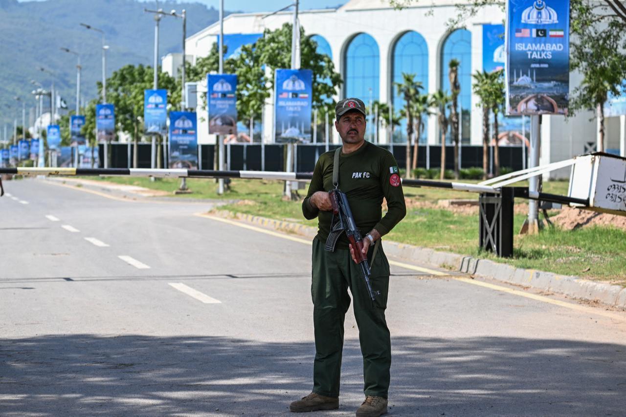 A security personnel stands guard near the Serena Hotel in Islamabad on April 19, 2026. (AFP Photo)