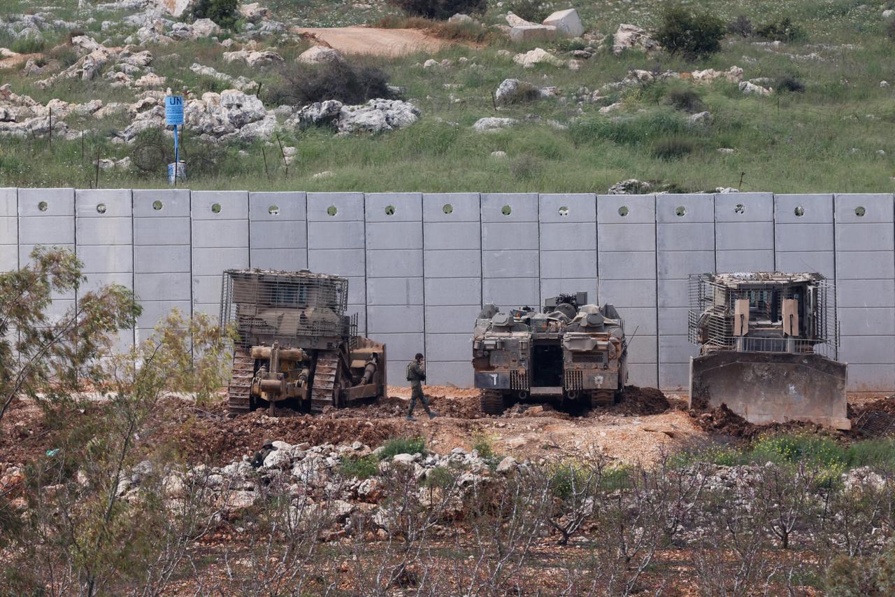 Israeli military vehicles are positioned along the Israel-Lebanon border, as seen from northern Israel, April 12, 2026. (AFP Photo)