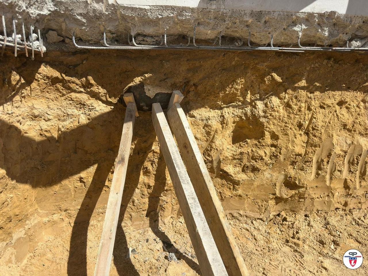 This undated handout image released by the Prefecture de Police on April 19, 2026 shows a partially exposed World War II bomb discovered near a residential area, which triggered a large-scale emergency response to neutralise the device in Colombes, a northwestern suburb of Paris. (AFP PHOTO /HO/ PREFECTURE DE POLICE )