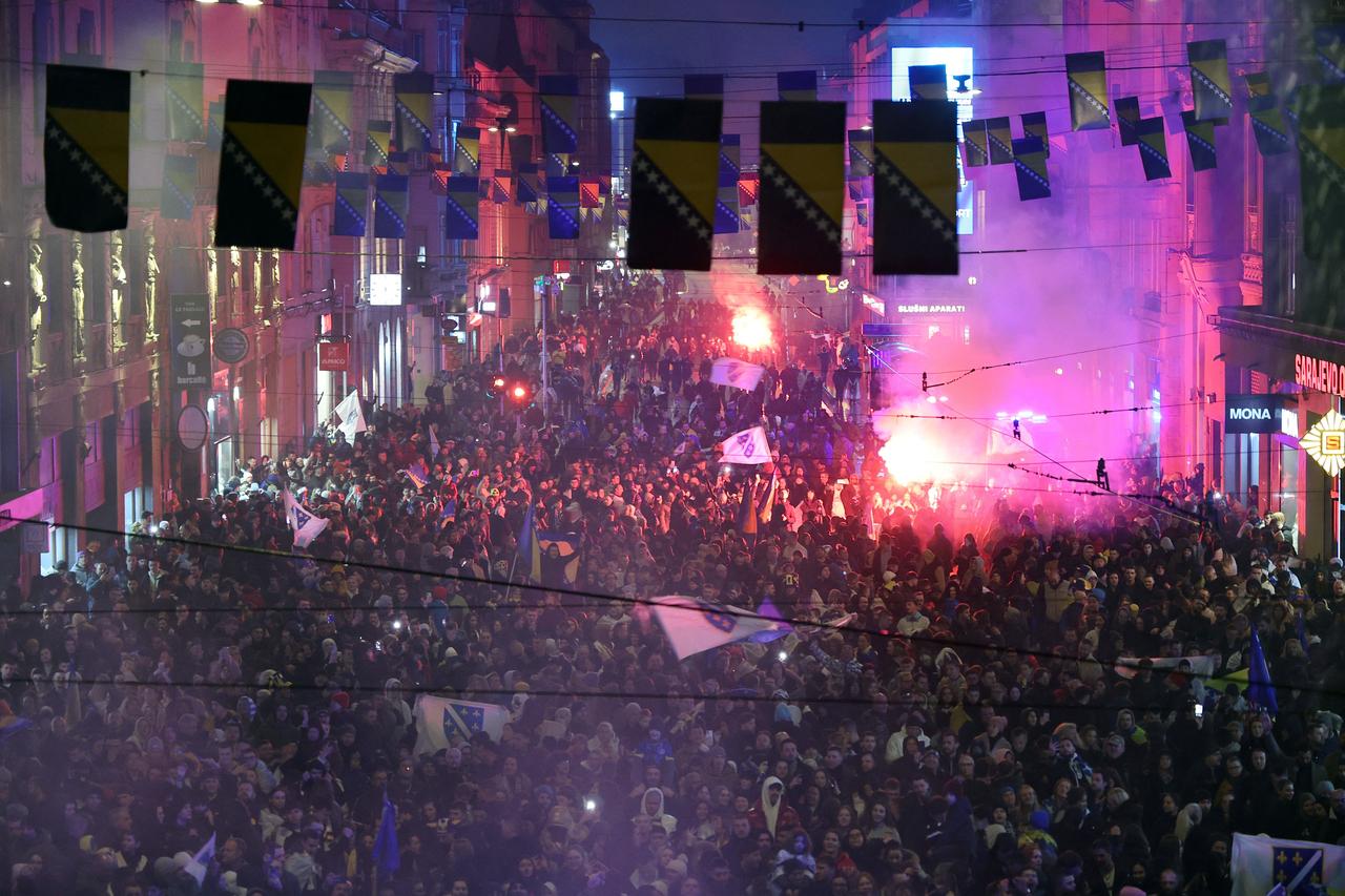 Supporters of Bosnia-Herzegovina's national team gather to celebrate in the early hours of April 1, 2026 in downtown Sarajevo. (AFP photo)