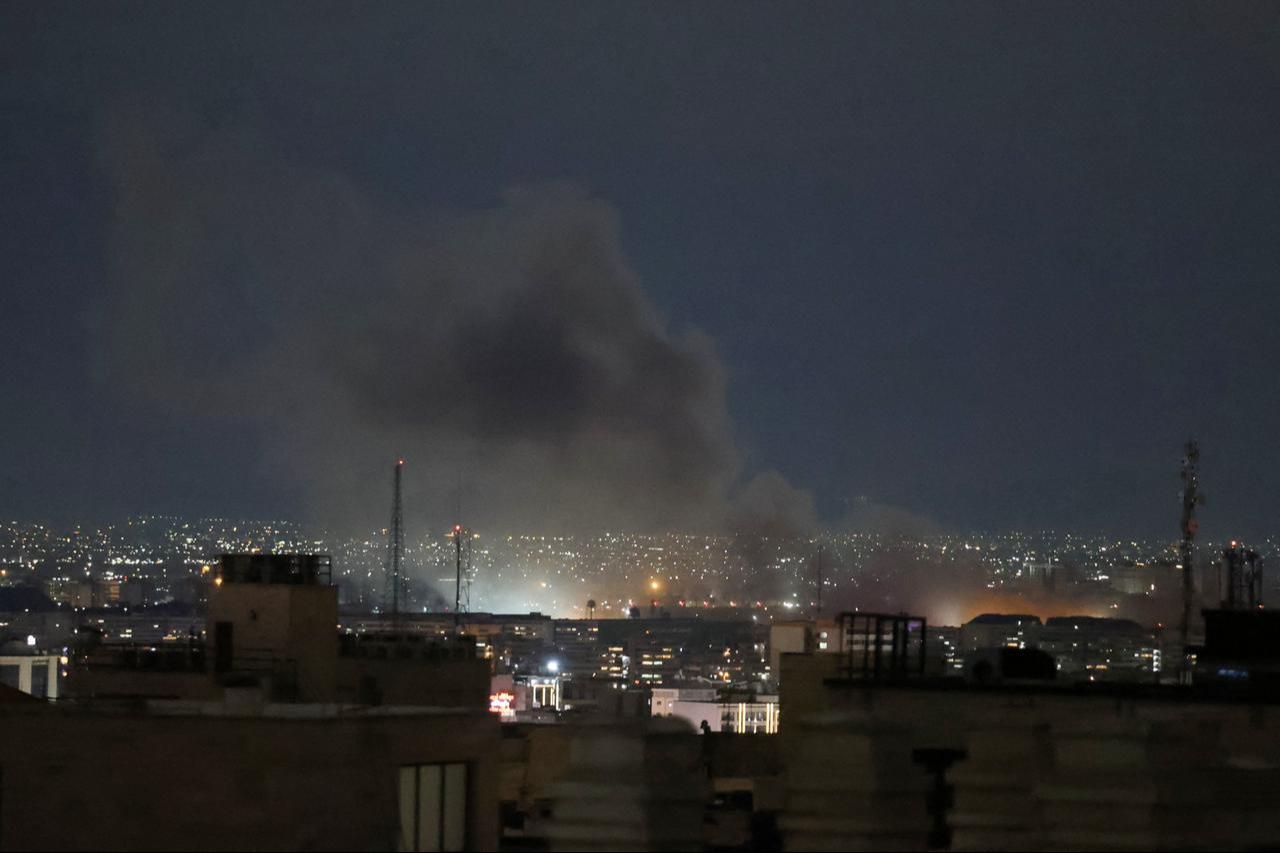 A plume of smoke rises from the site of a strike in Tehran, Iran early on March 28, 2026. (AFP Photo)