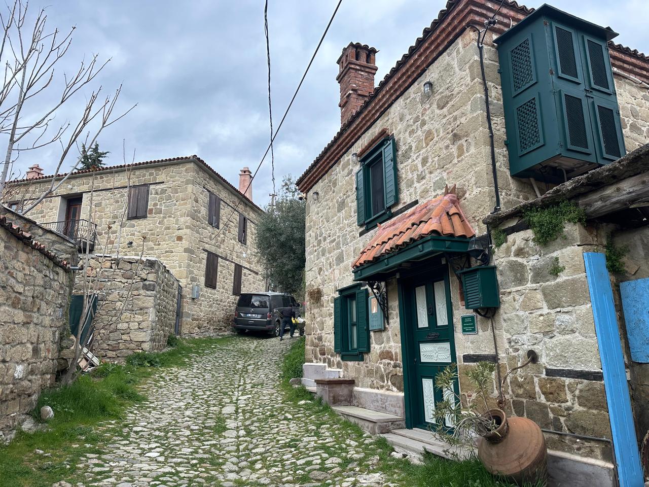 A view of traditional stone houses and narrow streets reflecting historic architecture in Adatepe village, Canakkale, Türkiye. (AA Photo)