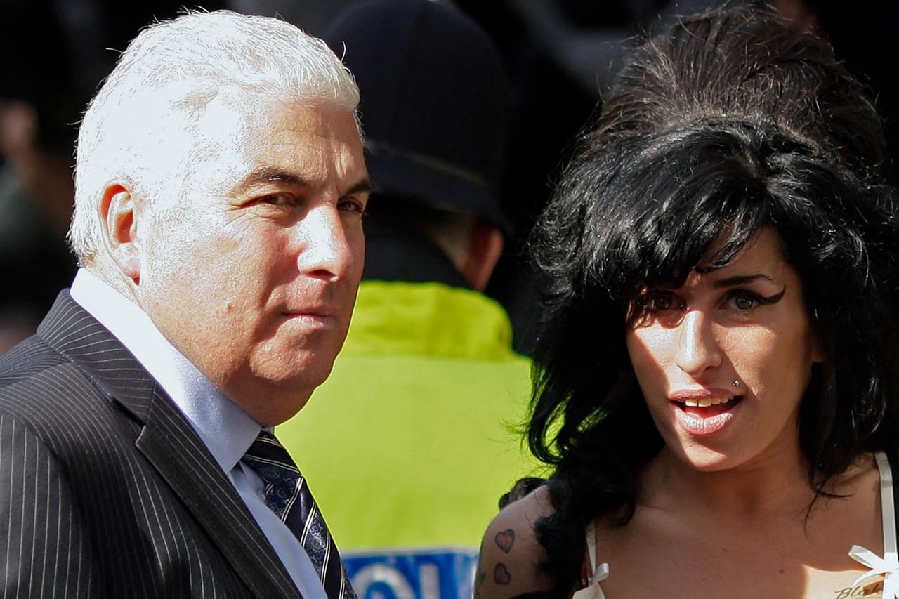 Amy Winehouse's father loses court fight over late singer's clothing, personal items