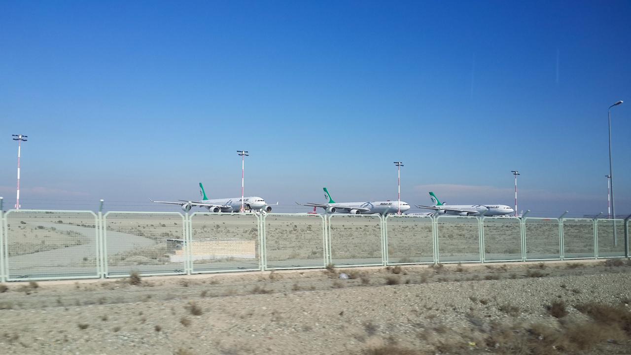 Mahan Air Airbus A340 aircraft are parked on the apron at Tehran’s Imam Khomeini International Airport in Iran, January 11, 2016. (Adobe Stock Photo)