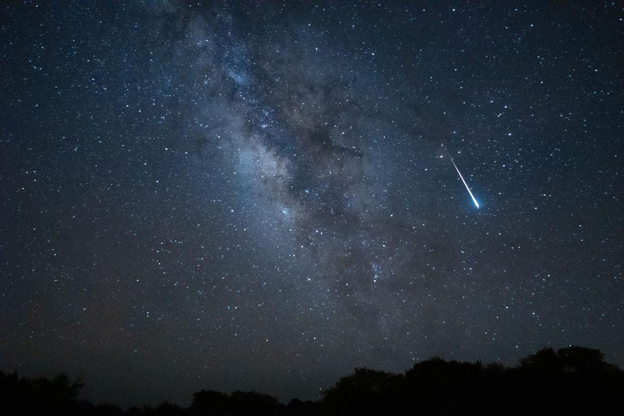 A Lyrid meteor streaks across the night sky over New Mexico in an undated Adobe Stock photo. (Adobe Stock)
