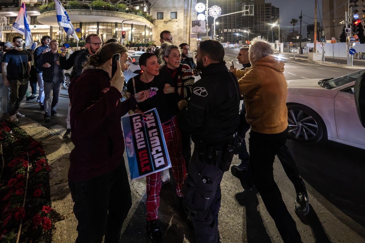 A protestor is detain as people gather to protest the policies of Israeli Prime Minister Benjamin Netanyahu and his government toward Palestinians in West Jerusalem on April 18, 2026. (AA Photo)