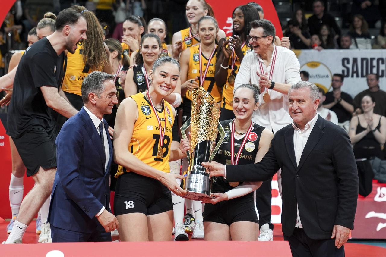 Youth and Sports Minister Osman Askin Bak (R) presents the championship trophy to the VakifBank team after they defeated Fenerbahce Medicana 3-2, Istanbul, Türkiye, April 19, 2026. (AA Photo)