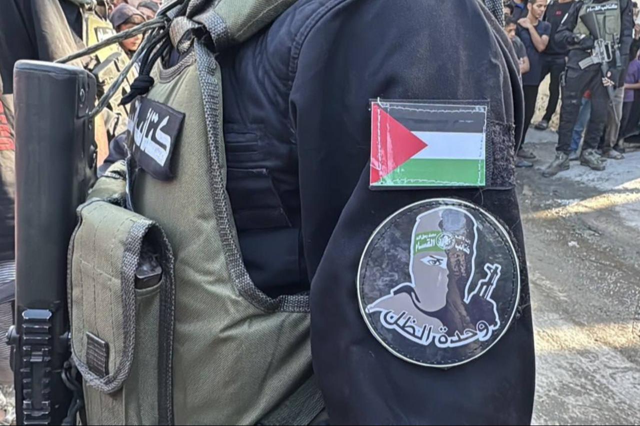 Hamas’ “Shadow” unit was seen handing over hostages to the Red Cross in Gaza on October 13, 2025. (Photo via X / @@trhaber_com)