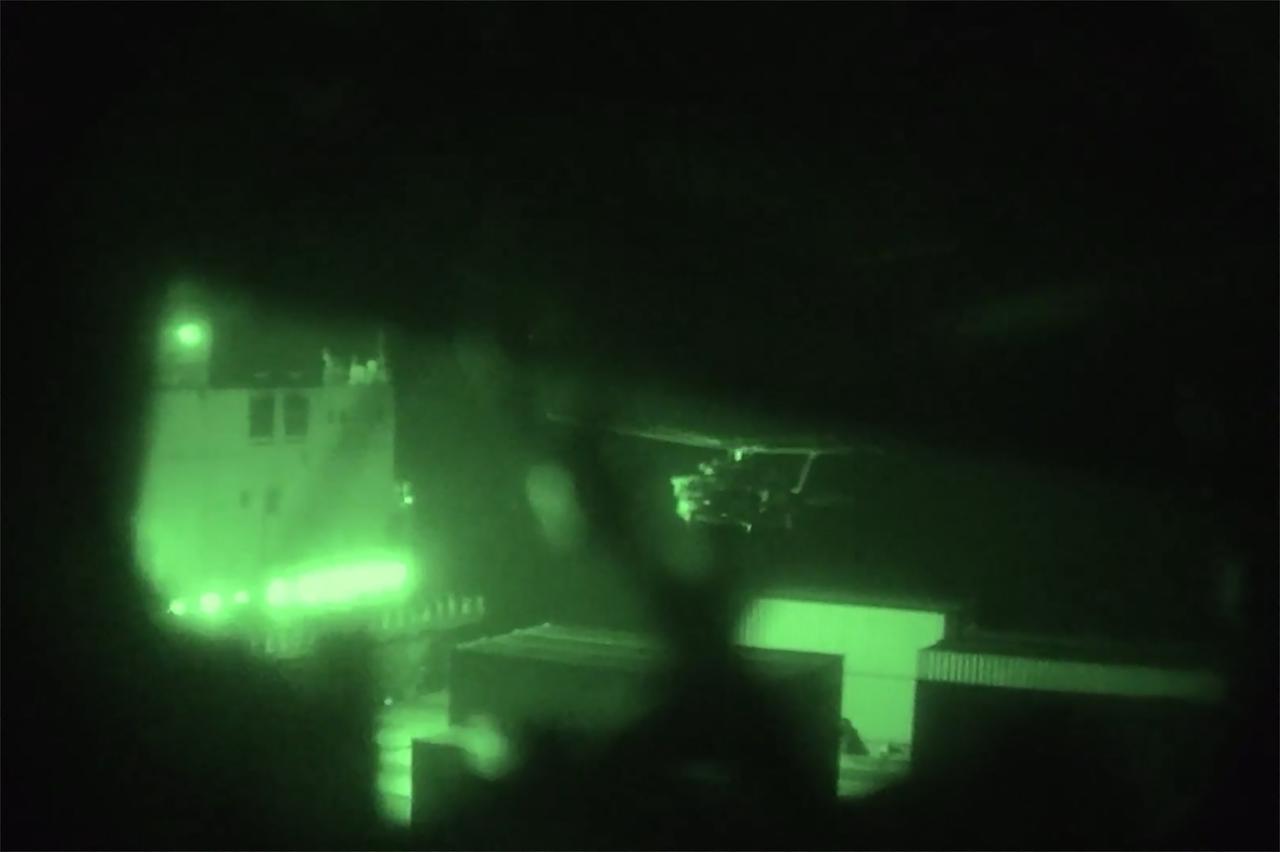 This screen grab obtained from a video released by the US Central Command on April 20, 2026, shows US Marines boarding and seizing the Iranian-flagged vessel M/V Touska after departing by helicopter from amphibious assault ship USS Tripoli in the Arabian sea on April 19, 2026. (AFP Photo)