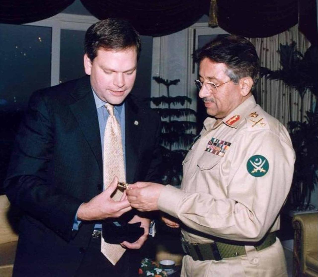 Stephen Payne is seen with Pakistan's former President Musharraf. (Personal archive)