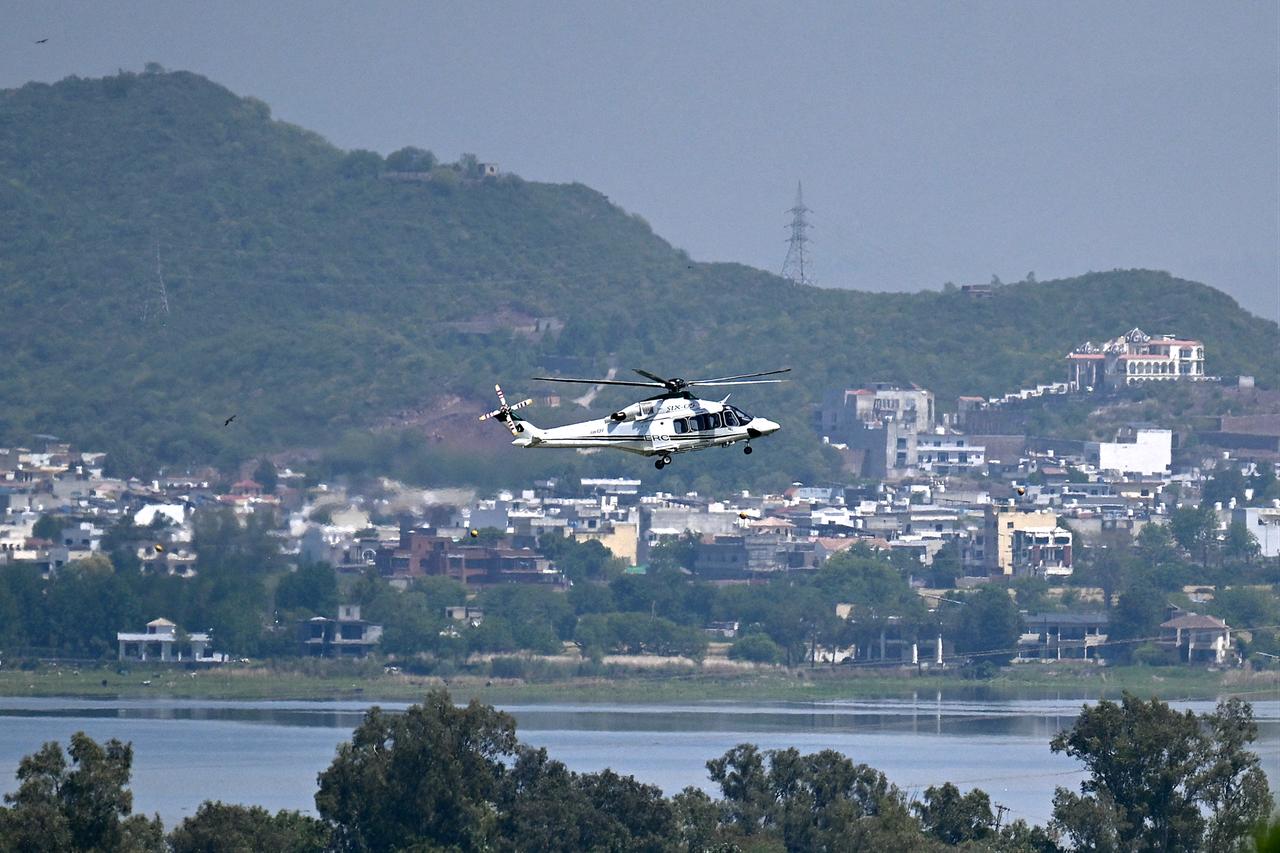 A helicopter flies over the Red Zone area in Islamabad, Pakistan on April 20, 2026. (AFP Photo)