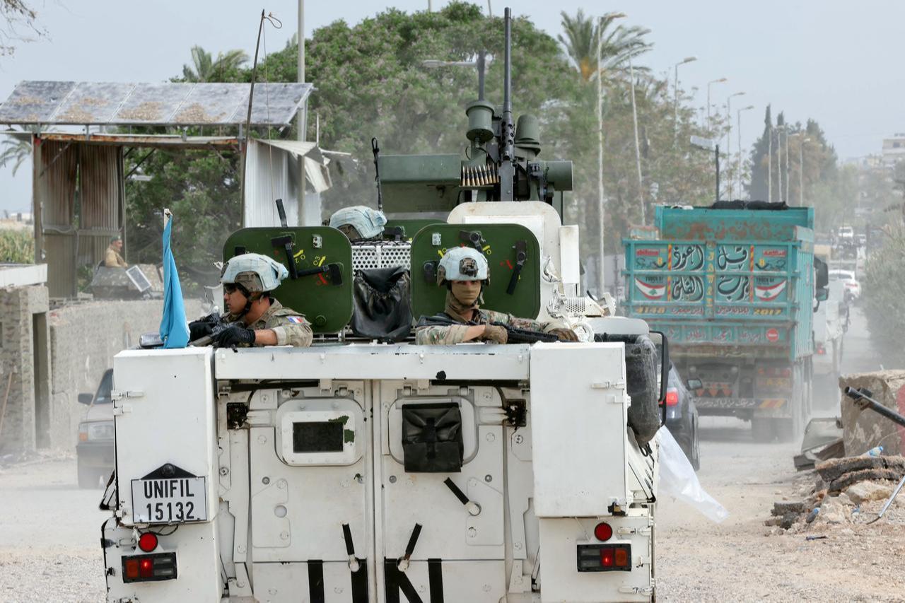 French contingent vehicles serving with the United Nations Interim Force in Lebanon (UNIFIL) cross the Qasmiyeh Bridge heading toward Sidon and Beirut, April 19, 2026. (AFP Photo)