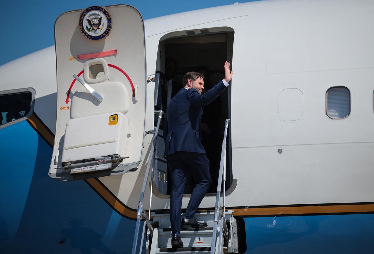 US Vice President JD Vance waves while boarding Air Force Two at Joint Base Andrews in Maryland, April 14, 2026. (AFP Photo)