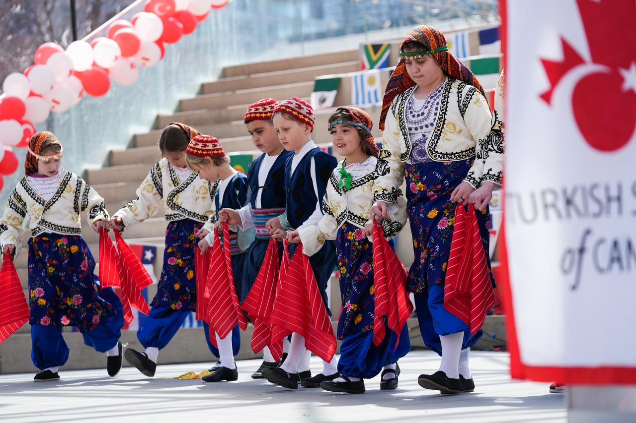 Children perform during the International Children's Day - Multicultural Dance and Art Festival organized by the Turkish Society of Canada at Nathan Phillips Square in Toronto, Ontario, Canada, April 11, 2026. (AA Photo)