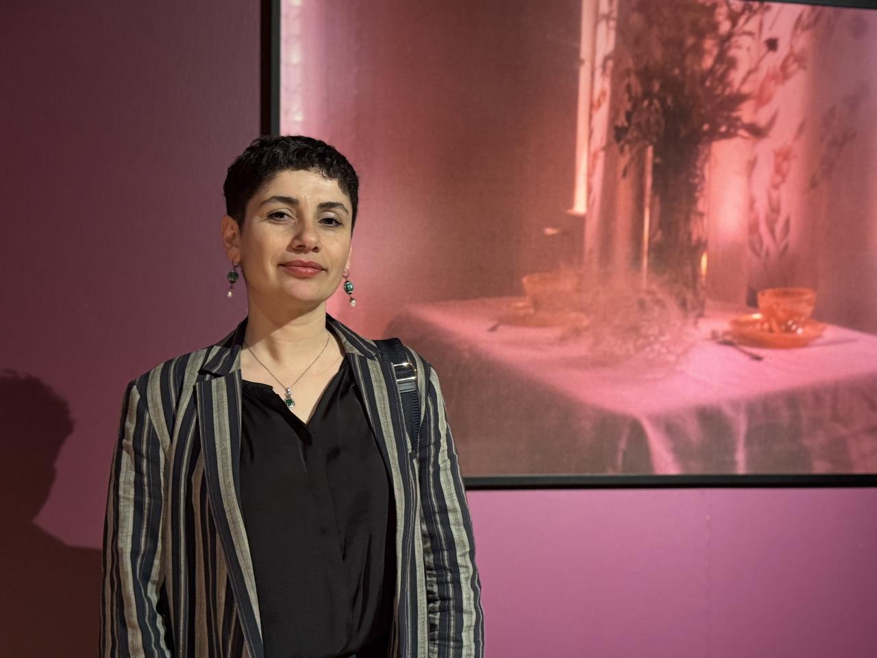 Artist Aksu Guney spoke to an Anadolu Agency correspondent, sharing insights about her works featured in the exhibition and the themes she explores through her artistic practice. Türkiye, April 22, 2026. (AA Photo)