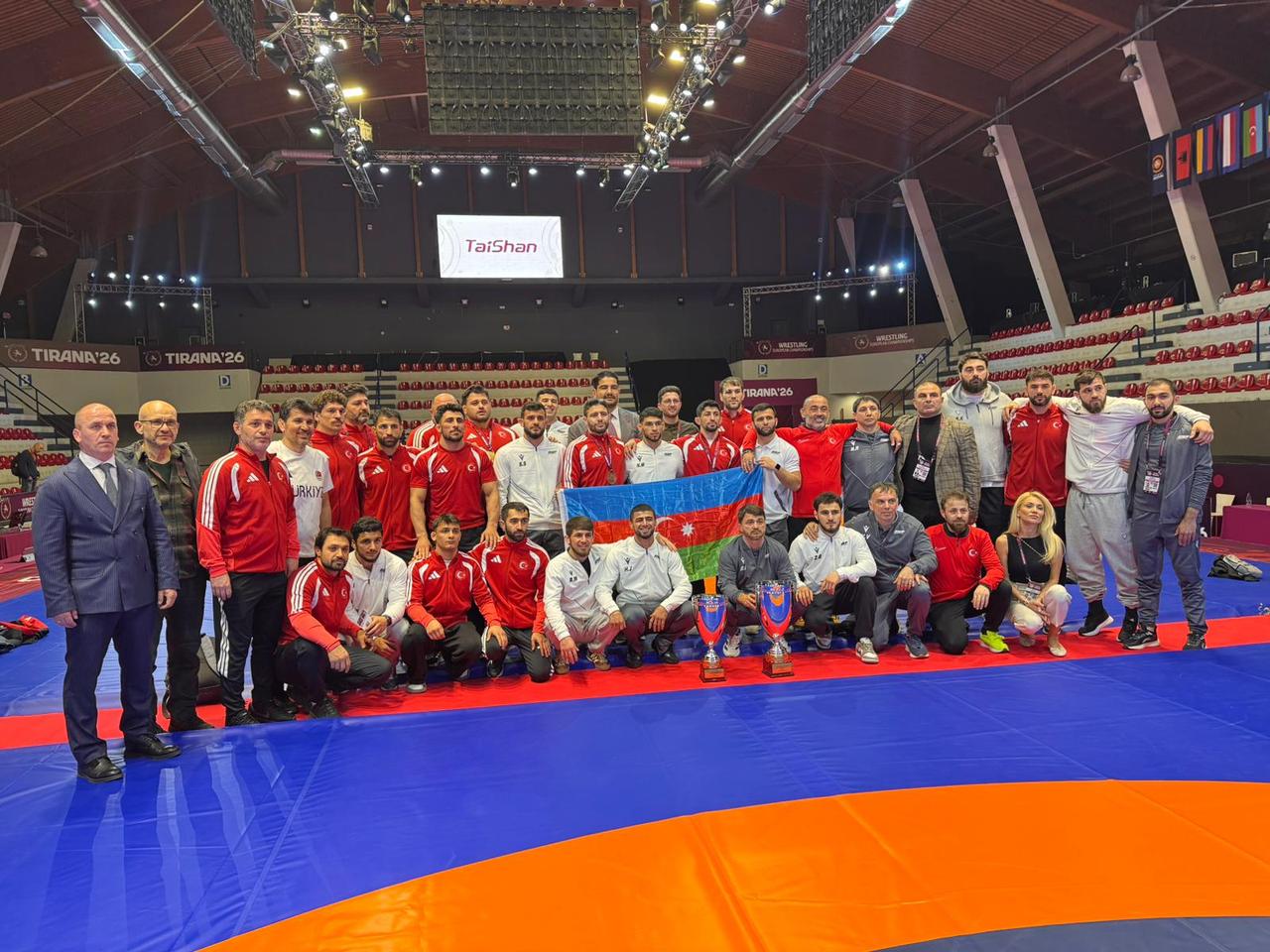 The Greco-Roman team champions Azerbaijan and second-placed Türkiye posed together for a group photograph. Albania, April 22, 2026. (AA Photo)