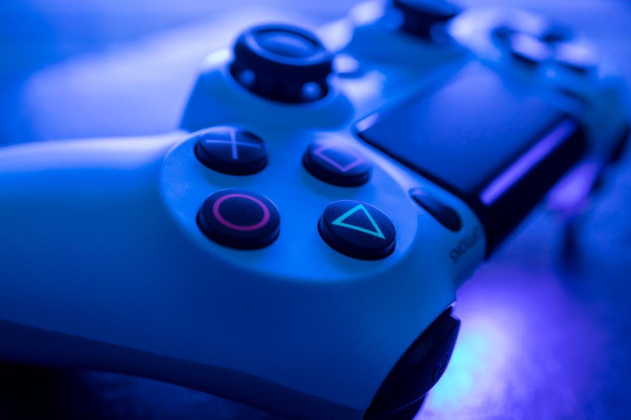 Video game gaming controller night with lights dark background top view in London on December 12, 2019. (Adobe Stock Photo)