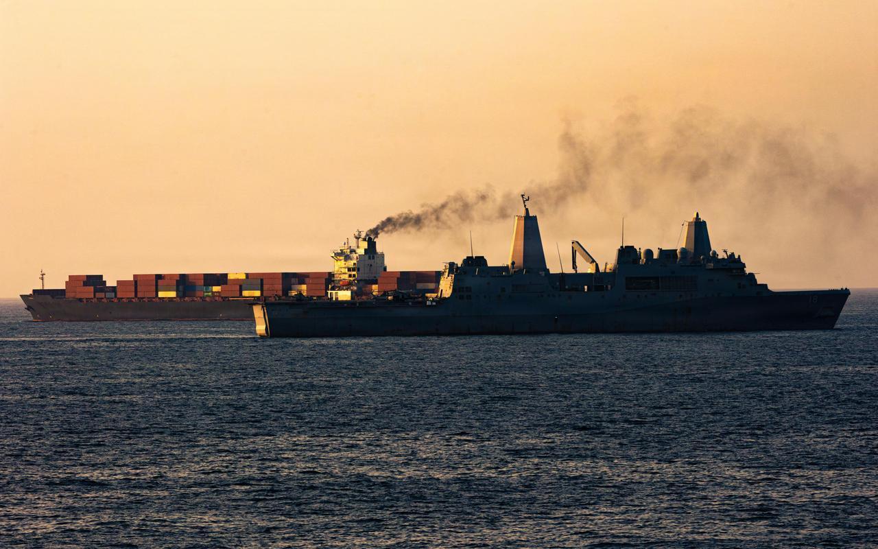 This US Navy handout photograph, released on April 21, 2026, shows US forces patrolling the Arabian Sea near the Touska, an Iranian-flagged cargo ship, April 20, 2026. (Photo via US Navy/CENTCOM/HO/AFP)