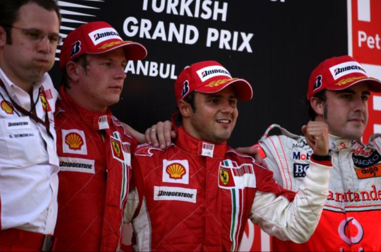 Stefano Domenicali, Sporting Director, Ferrari, Kimi Raikkonen, Ferrari F2007, Felipe Massa, Ferrari F2007 and Fernando Alonso, McLaren MP4-22 Mercedes on the podium, 2007 Turkish Grand Prix in Istanbul Park, Istanbul, Türkiye, August, 2007.