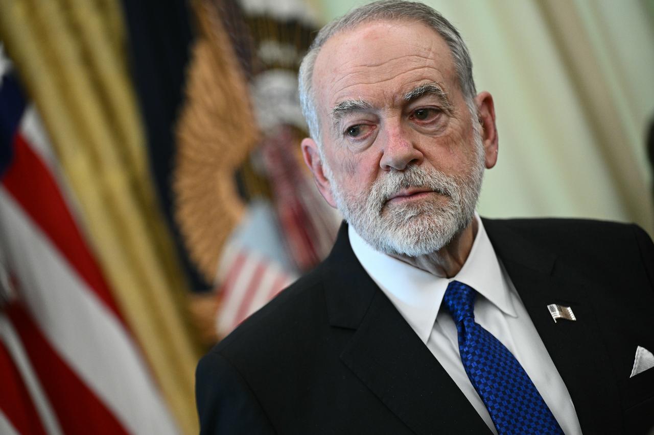US Ambassador to Israel Mike Huckabee listens during a meeting with US President Donald Trump, Lebanon's Ambassador to the US, Nada Hamadeh Moawad, and Israel's Ambassador to the US, Yechiel Leiter, at the White House in Washington, DC on April 23, 2026. (AFP Photo)