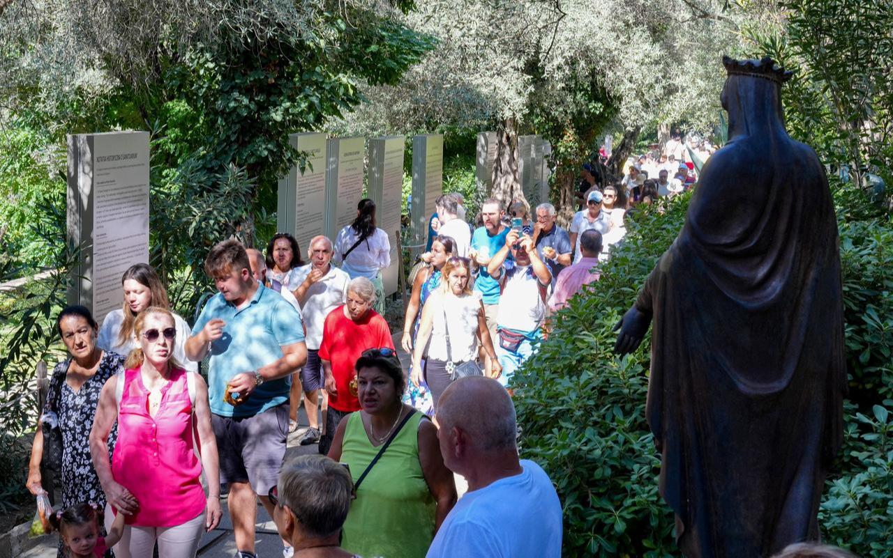 Christians light candles, pray and hang the wishes they wrote on napkins and papers at the wish-making place at the Virgin Mary House in Selcuk, Izmir, Türkiye, August 15, 2024 (AA Photo)