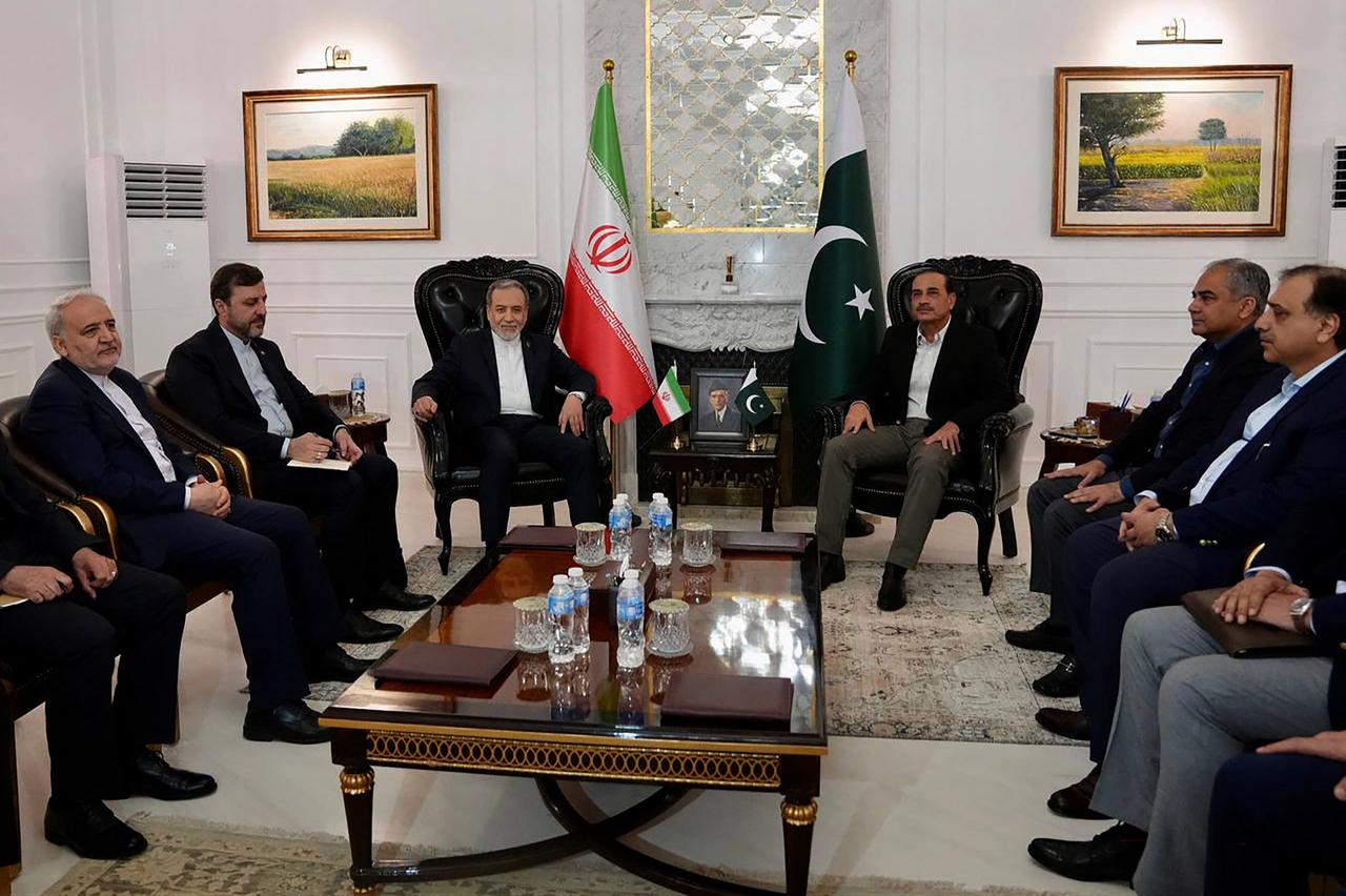 This handout photo released by the Iranian Foreign Ministry on April 25, 2026 shows Pakistan's Army Chief and Field Marshal Syed Asim Munir (3rd R) meeting with Iran's Foreign Minister Abbas Araghchi (3rd L) upon his arrival in Islamabad, Pakistan. (AFP Photo)