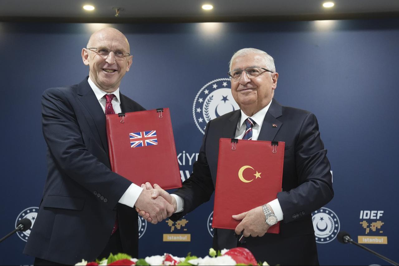 Defense Minister Yasar Guler (R) and British Defense Secretary John Healey (L) sign a comprehensive memorandum of understanding regarding Türkiyes acceptance as a Eurofighter Typhoon user in Istanbul, Türkiye on July 23, 2025. (Photo via Turkish MoD)