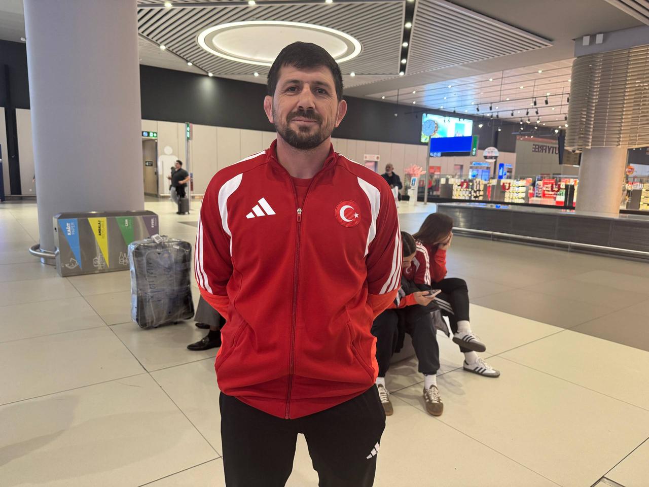 Head coach Ayhan Sucu speaks after Türkiye’s women’s wrestling team finished second with six medals at the 2026 European Championships, Istanbul, Türkiye, April 25, 2026. (AA Photo)