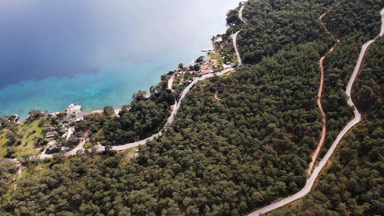 An aerial view shows the Marmaris-Akyaka (Kıran) stage route of the 61st Presidential Cycling Tour of Türkiye (TUR 2026) in Muğla, Turkiye, April 26, 2026. (AA Photo)