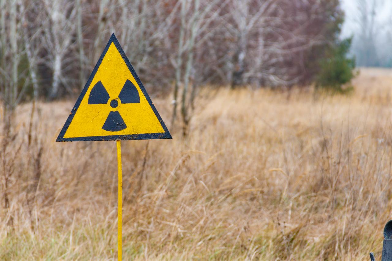 Radiation warning sign in Chernobyl Exclusion Zone in Ukraine. (Adobe Stock Photo)