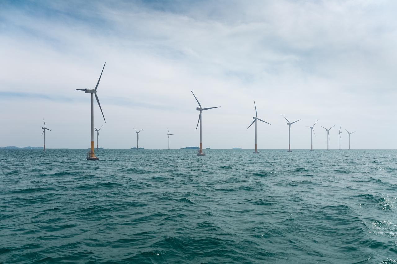 Offshore wind farms are a key component of the global transition to renewable energy, harnessing strong sea winds to power thousands of homes. (Adobe Stock Photo)