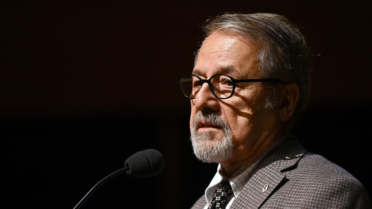 Prof. Naci Gorur speaks at a podium during an event in an unspecified location, undated. (AA Photo)
