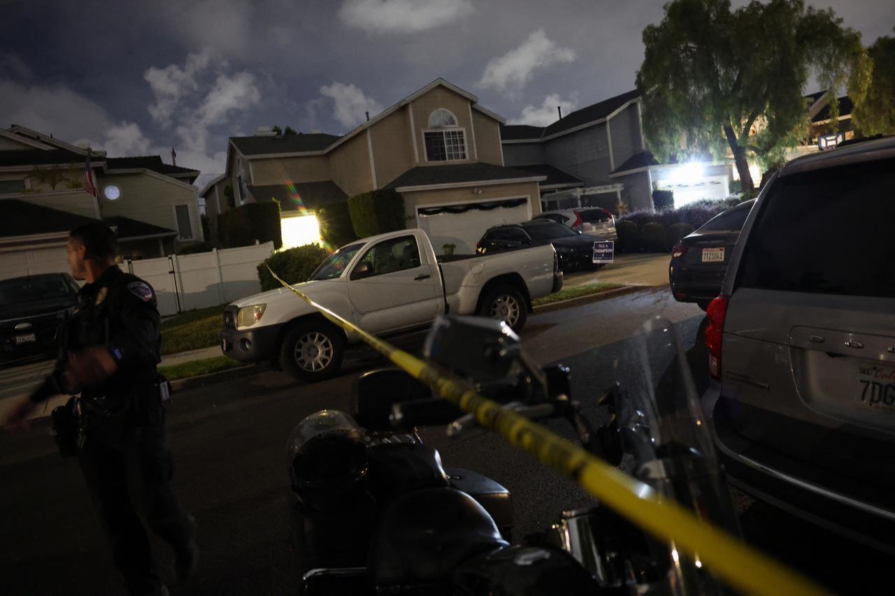 Torrance police department officers move members of the media back after FBI agents arrived a residence associated with the alleged White House Correspondents’ Dinner shooter in Torrance, California, April 25, 2026. (AFP Photo)