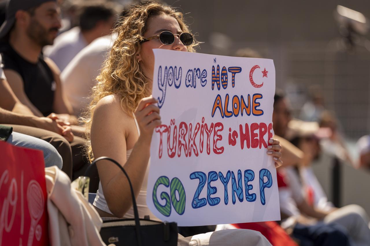 Fans support while Turkish tennis player Zeynep Sonmez (not seen) is in action against Argentine's Solana Sierra (not seen) during the WTA women's singles third-round match of the Mutua Madrid Open at Caja Magica in Madrid, Spain, April 26, 2026. (AA Photo)