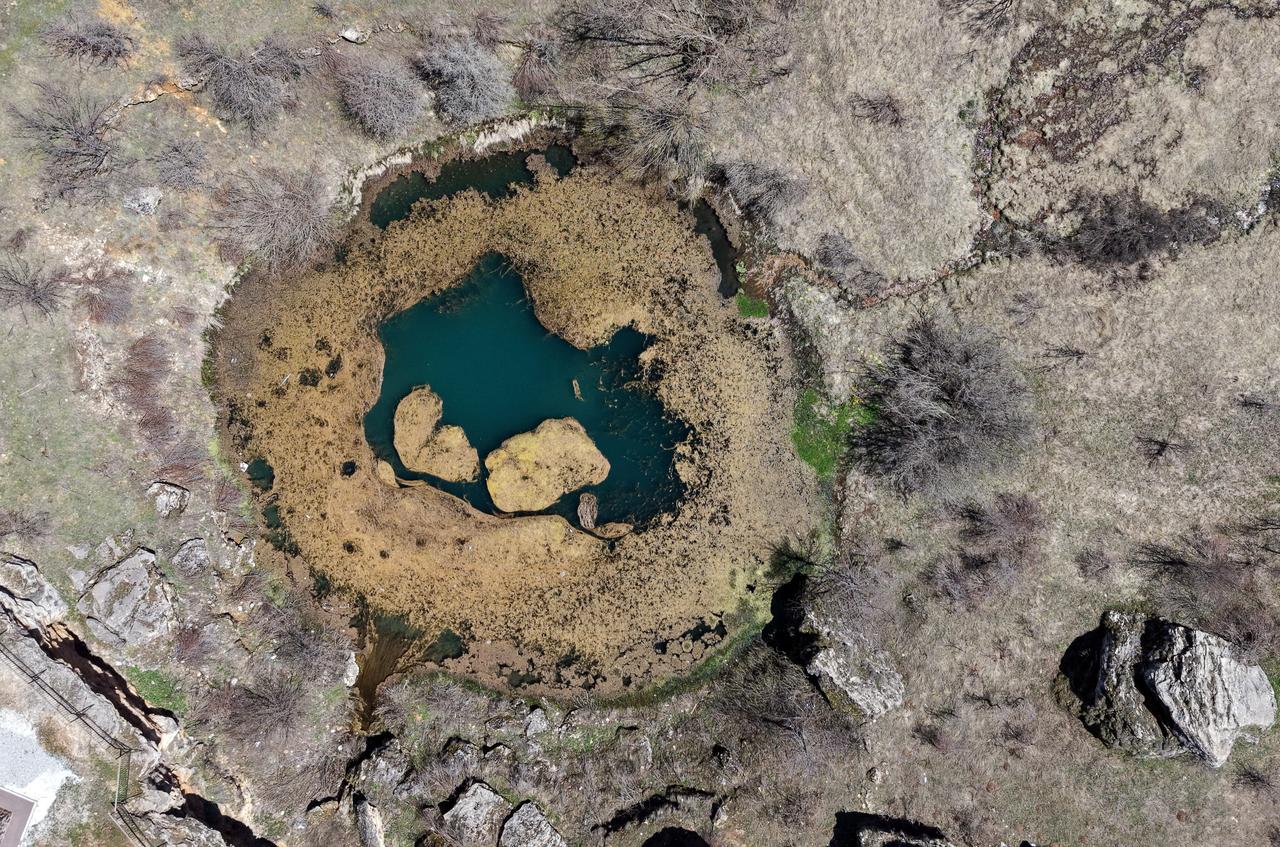 Top view of Dipsizgol, the water source feeding the nearby waterfall, Dogansar, Sivas, Türkiye, April 27, 2026. (AA Photo)