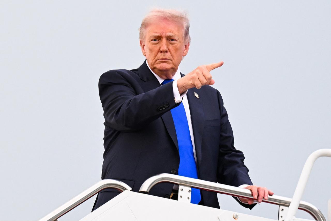 U.S. President Donald Trump boards Air Force One at Joint Base Andrews, Maryland, April 24, 2026. (AFP Photo)